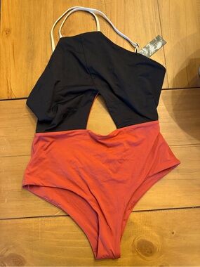 Color-Block Black and Coral/Orange One-Piece Swimsuit with Cutout
